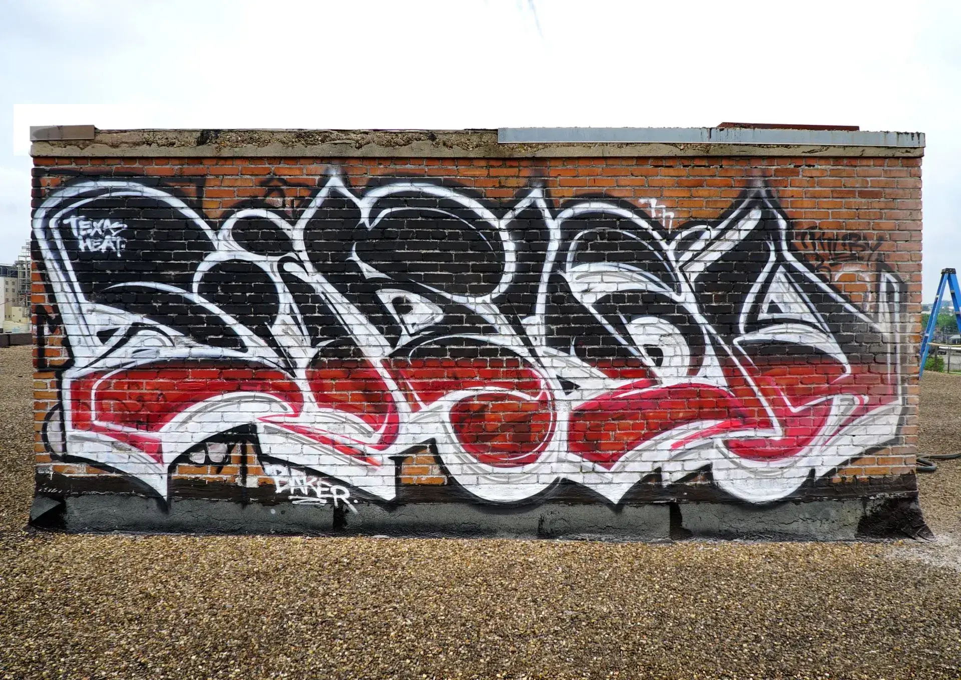 Before: Urban Brick Wall Graffiti Removal