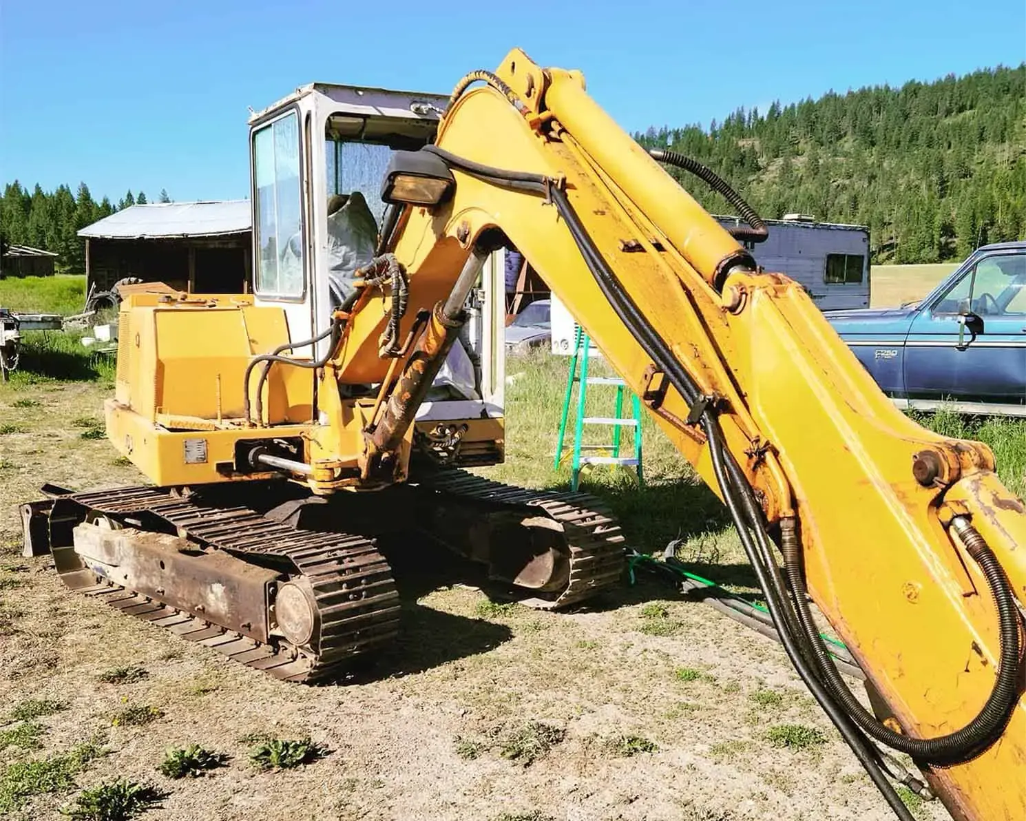 Before: Compact Excavator Surface Rust & Paint Removal